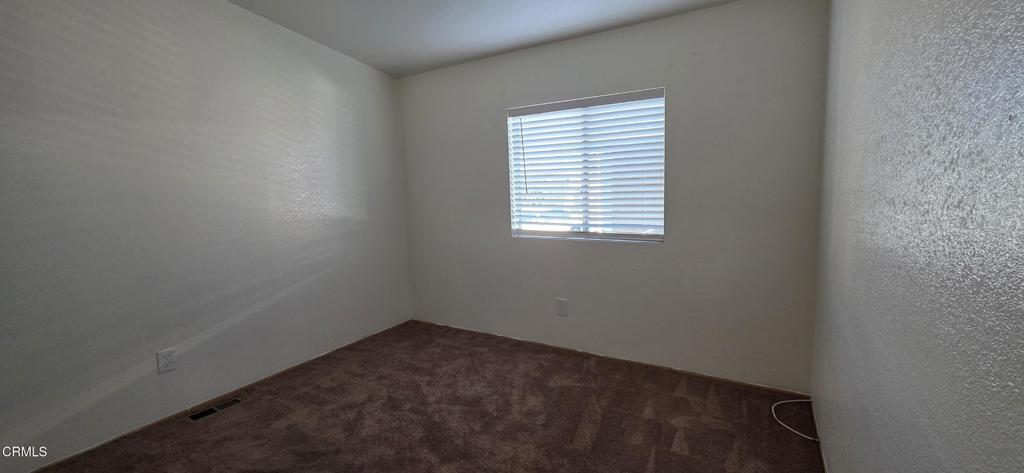 1645 Lime Avenue, Unit 91 Oxnard, CA 93033 - Photo 8 of 17 an empty room with a window