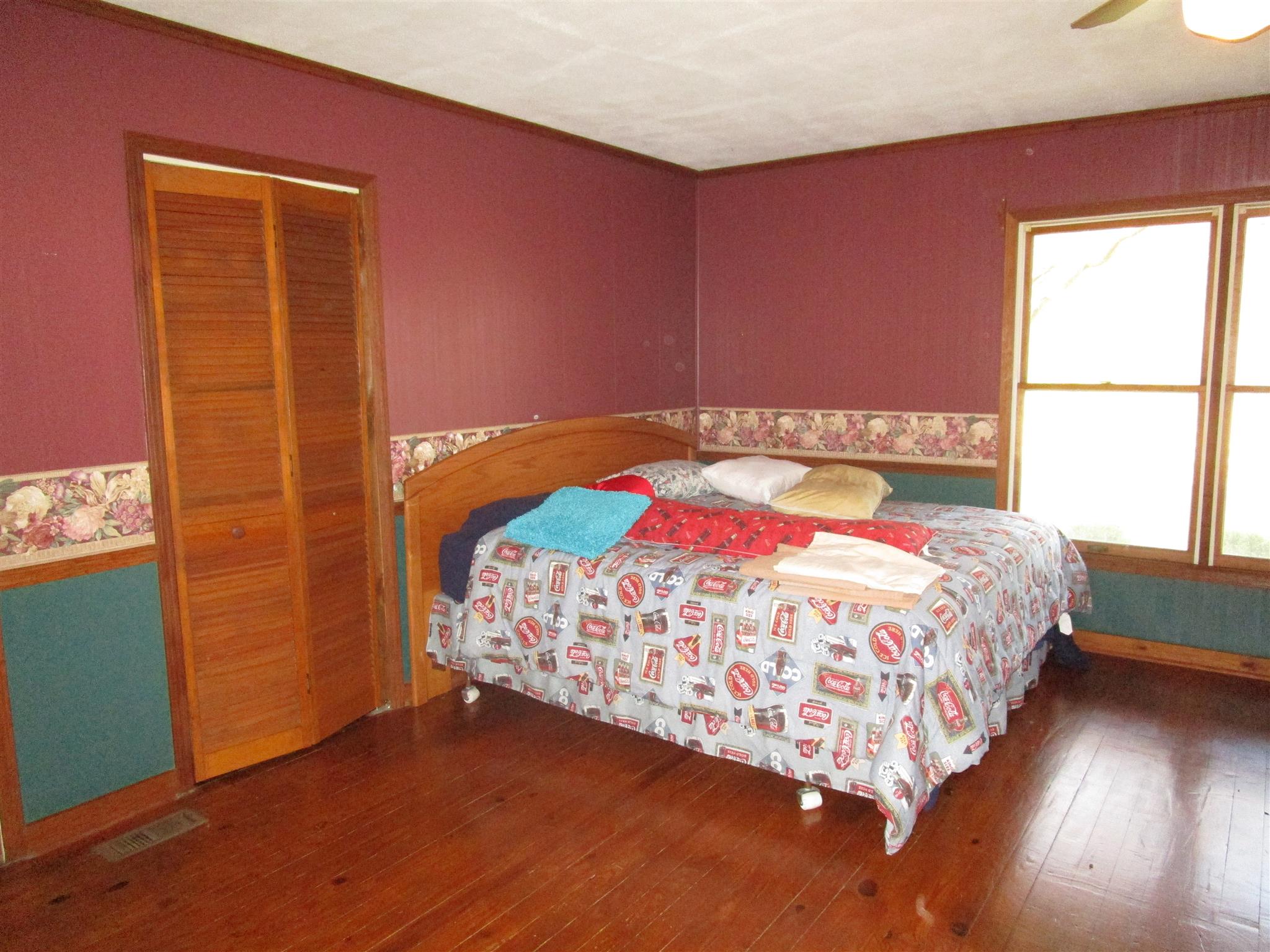 4020 Stella Road Prospect, TN 38477 - Photo 13 of 27 a bedroom with a bed and a window