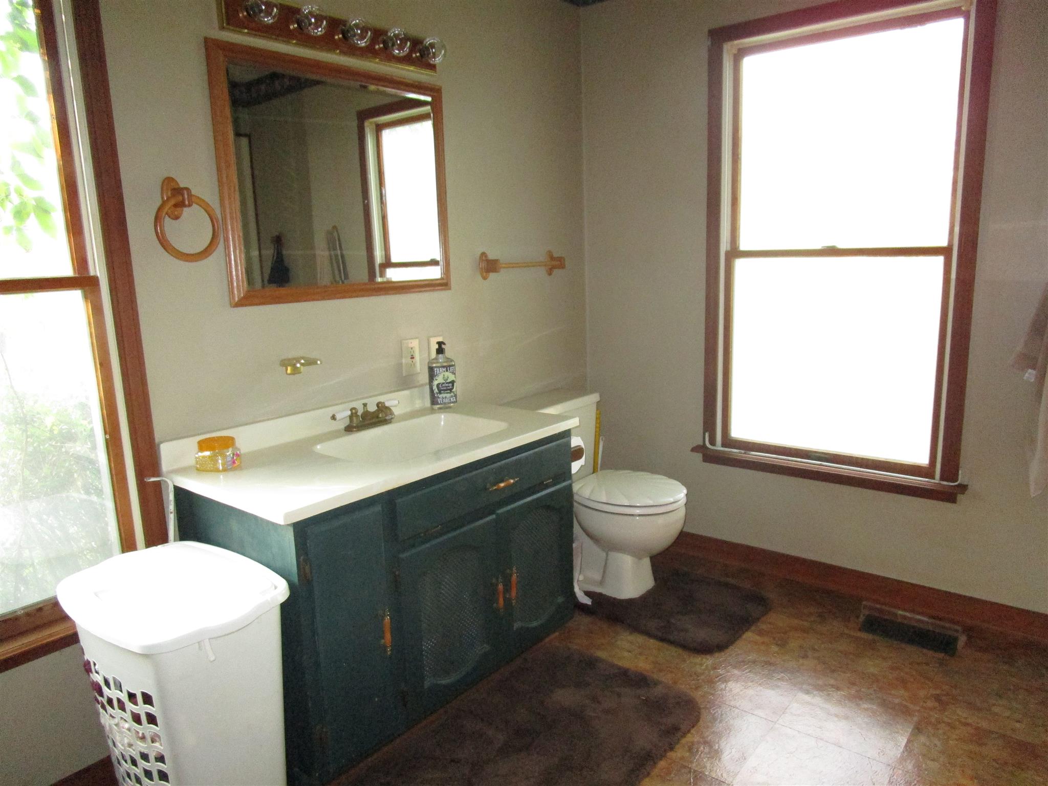4020 Stella Road Prospect, TN 38477 - Photo 16 of 27 a bathroom with a toilet sink and mirror