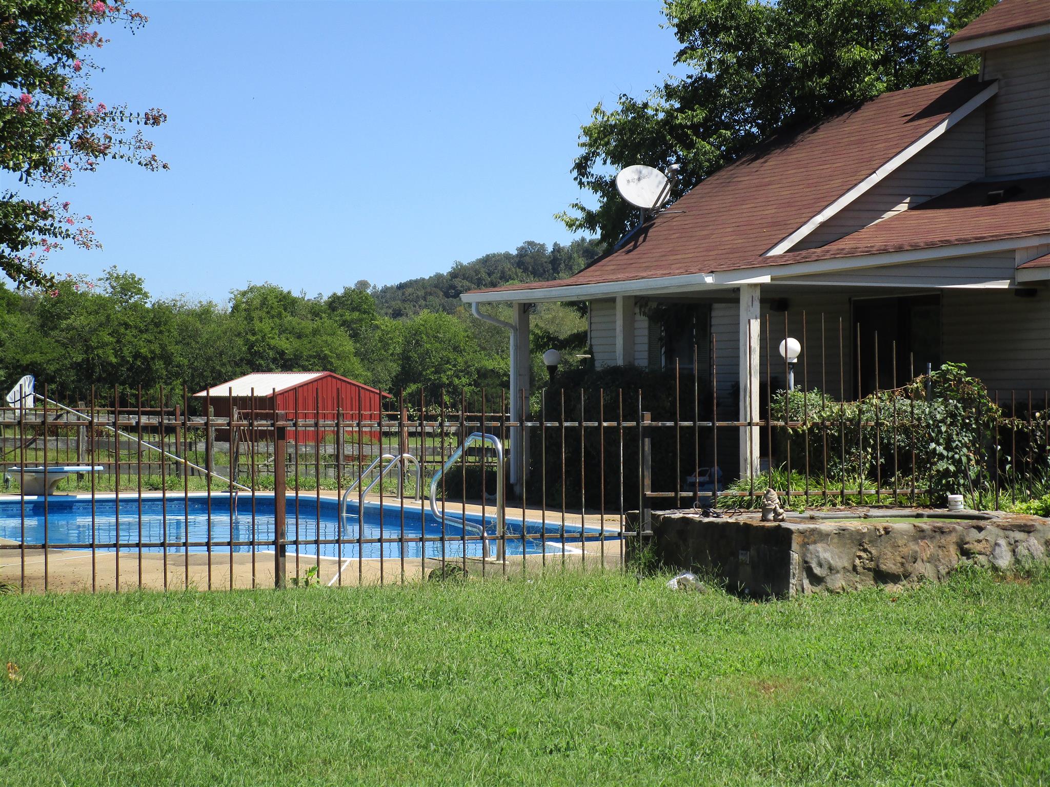 4020 Stella Road Prospect, TN 38477 - Photo 22 of 27 a view of a house with pool and a yard