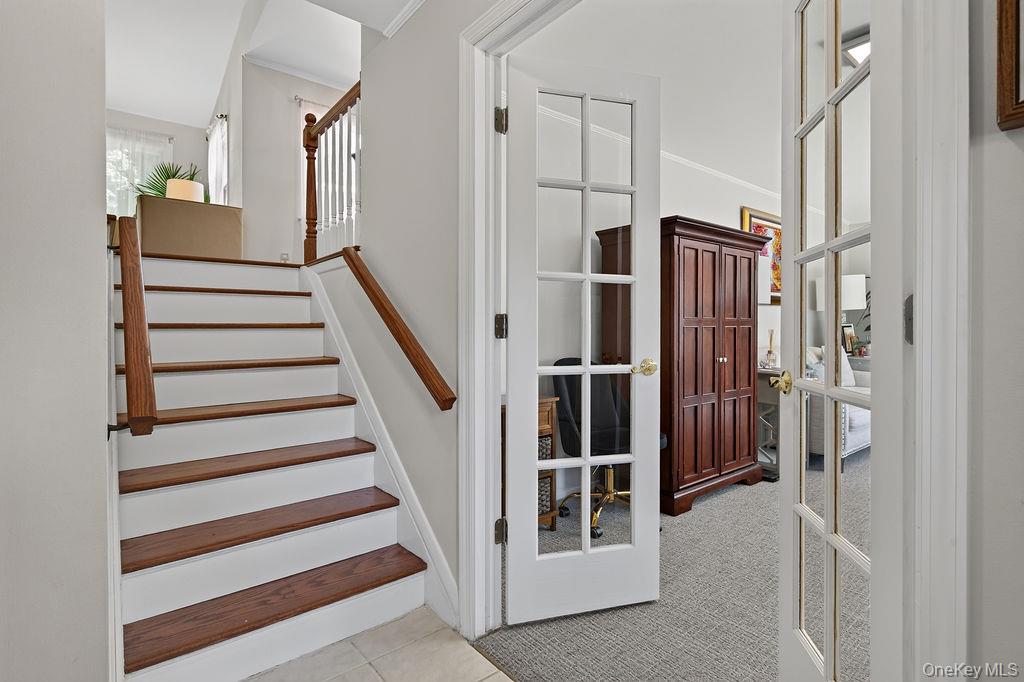 11 Oakridge Road White Plains, NY 10607 - Photo 5 of 34 family room with french doors from entry hall