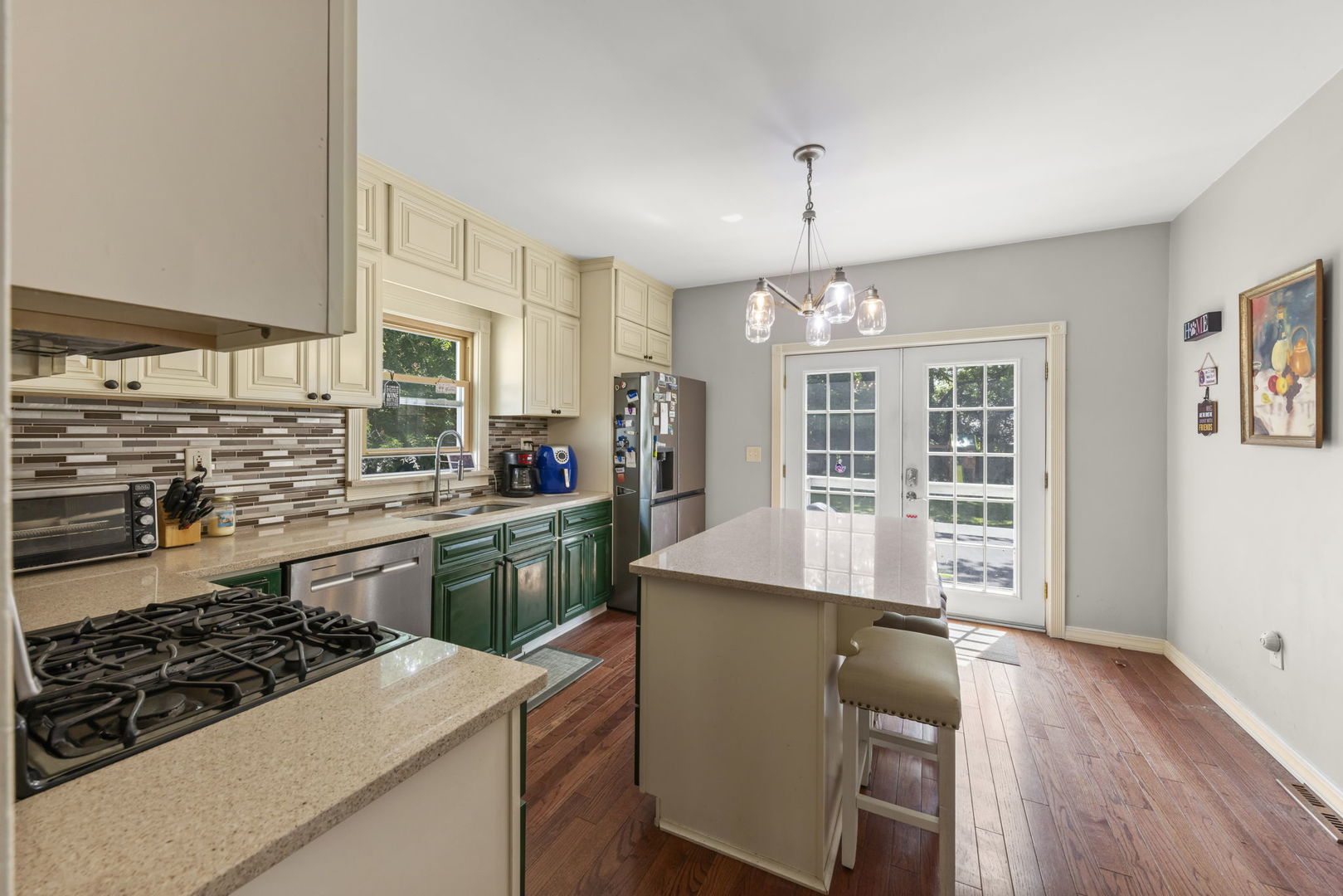 520 South Jefferson Street Lockport, IL 60441 - Photo 8 of 31 a kitchen with stove and wooden floor