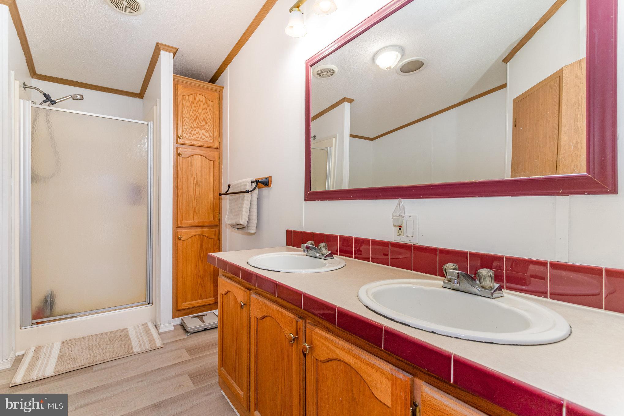 1050 Lisburn Road Wellsville, PA 17365 - Photo 17 of 35 a bathroom with a sink and a mirror