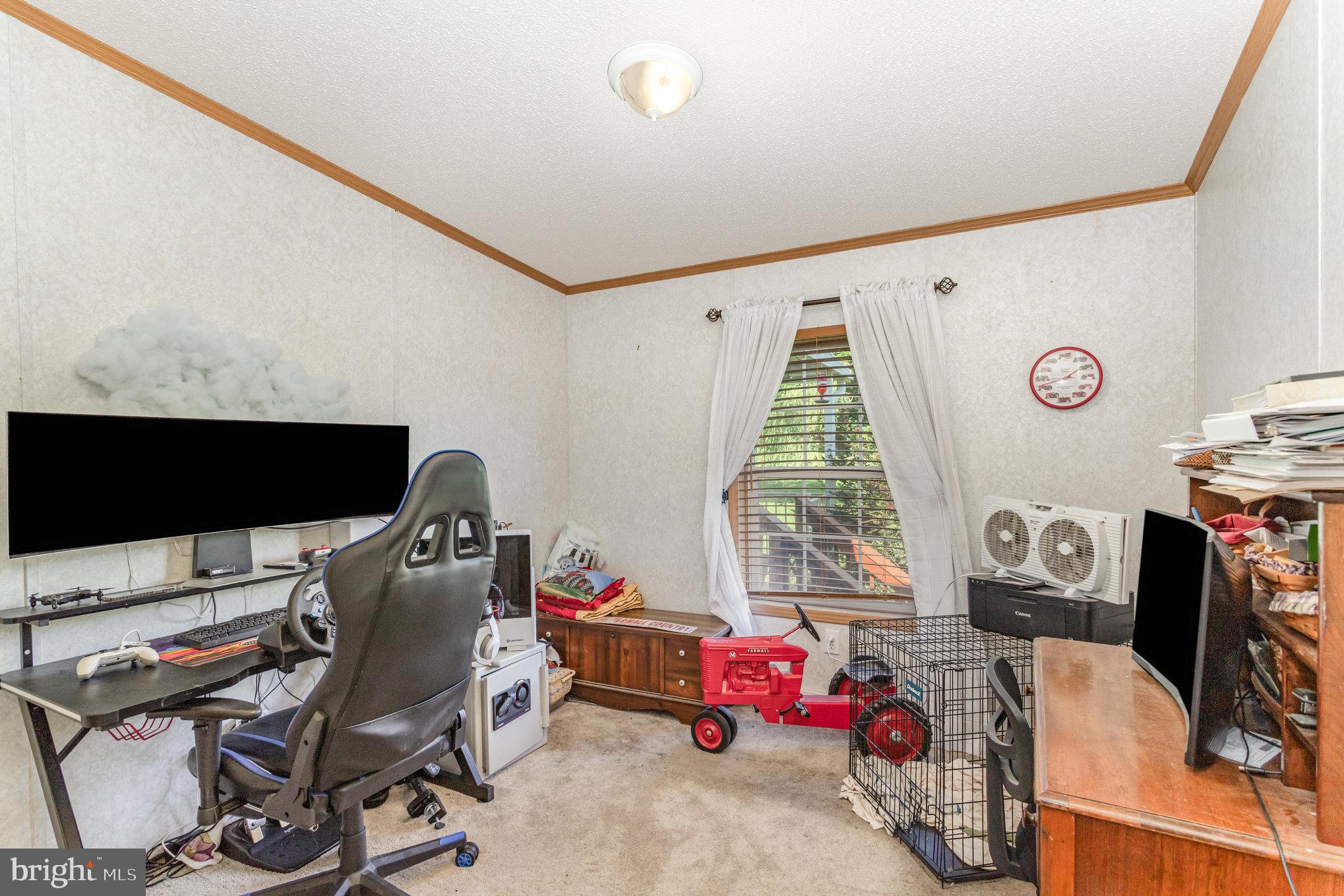 1050 Lisburn Road Wellsville, PA 17365 - Photo 22 of 35 a bedroom with furniture and a window