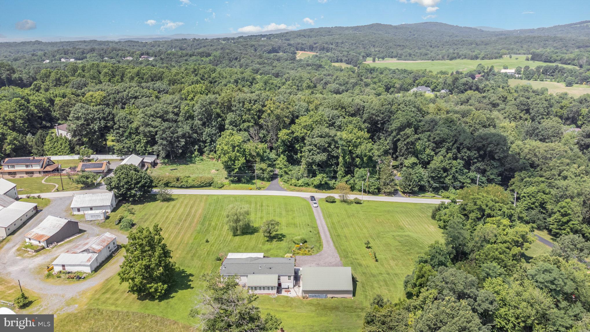 1050 Lisburn Road Wellsville, PA 17365 - Photo 31 of 35 an aerial view of a house with a yard