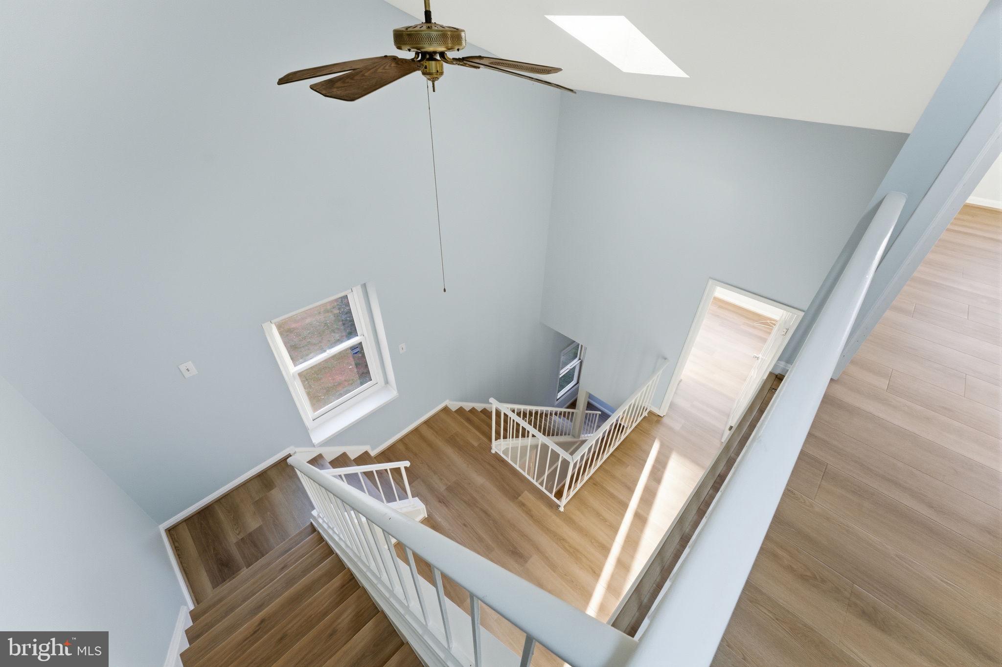 7498 Tangier Way Manassas, VA 20109 - Photo 33 of 40 Stairs and ceiling fan