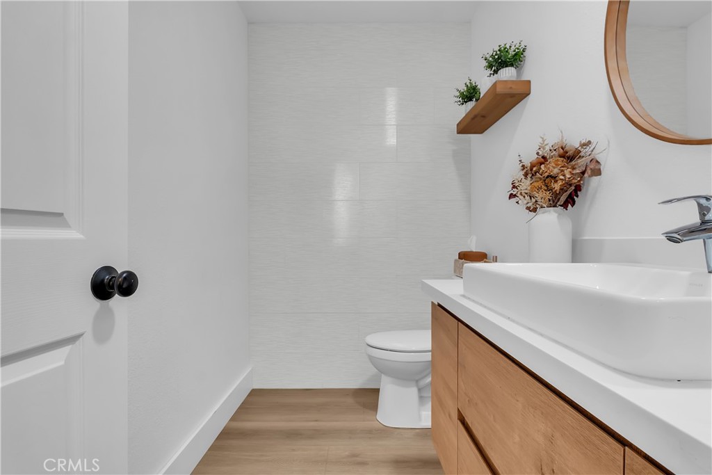 5931 East Rocking Horse Way, Unit 15 Orange, CA 92869 - Photo 19 of 43 Downstairs half bath