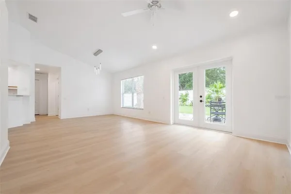 a view of an empty room with a window