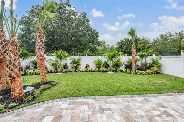 a view of a garden with a fountain