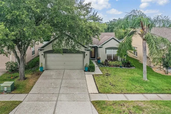front view of a house with a yard