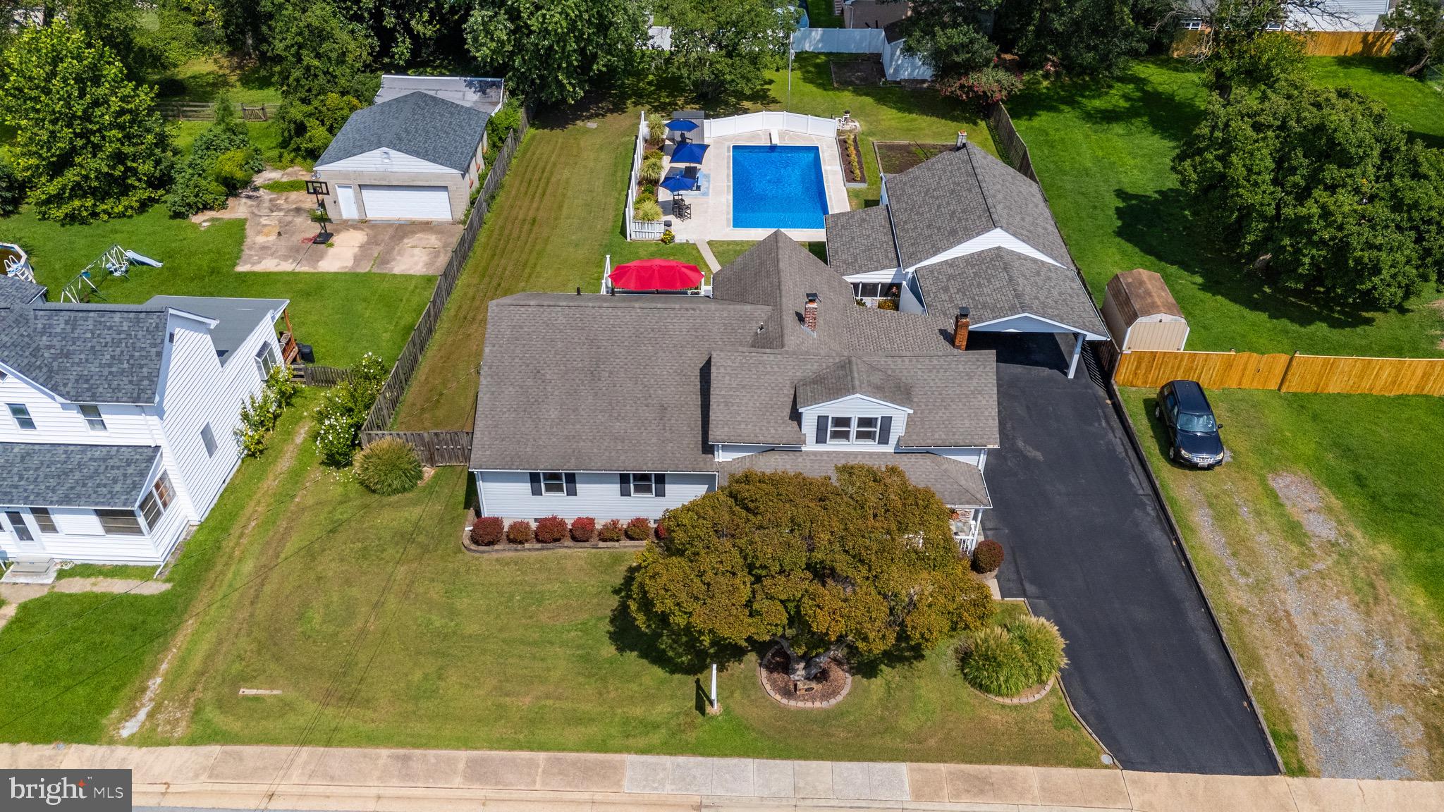 332 Poplar Road Baltimore, MD 21221 - Photo 52 of 59 an aerial view of a house with garden space and street view