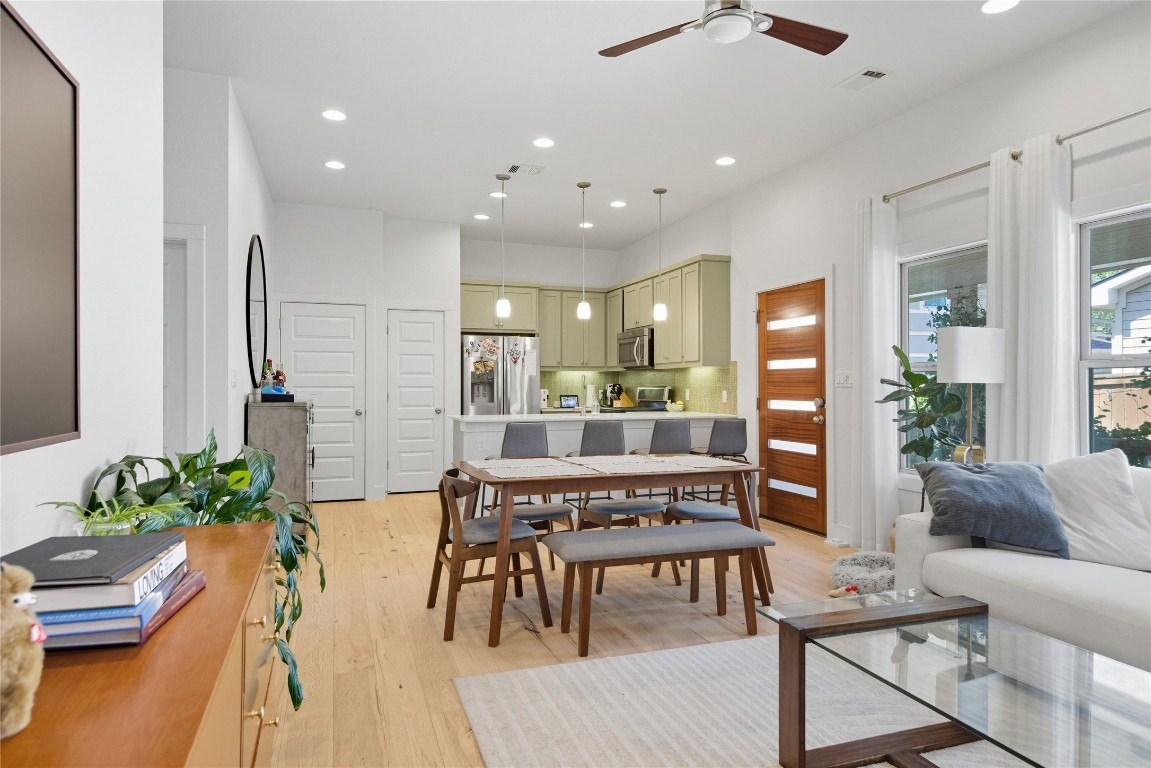 a living room with furniture and a table