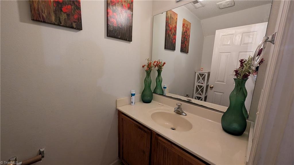 1067 Bridgend Drive High Point, NC 27282 - Photo 4 of 10 Downstairs half bath