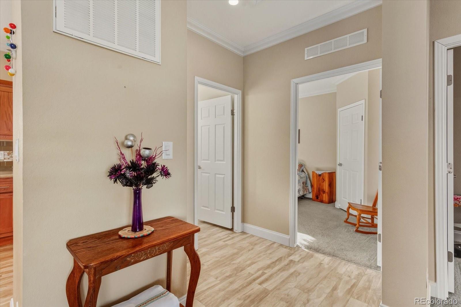 655 Quarry Station Poncha Springs, CO 81242 - Photo 17 of 42 a view of a room with a table and a chandelier