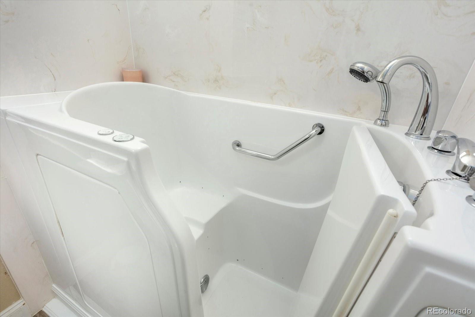 655 Quarry Station Poncha Springs, CO 81242 - Photo 20 of 41 a bathroom with a white bath tub