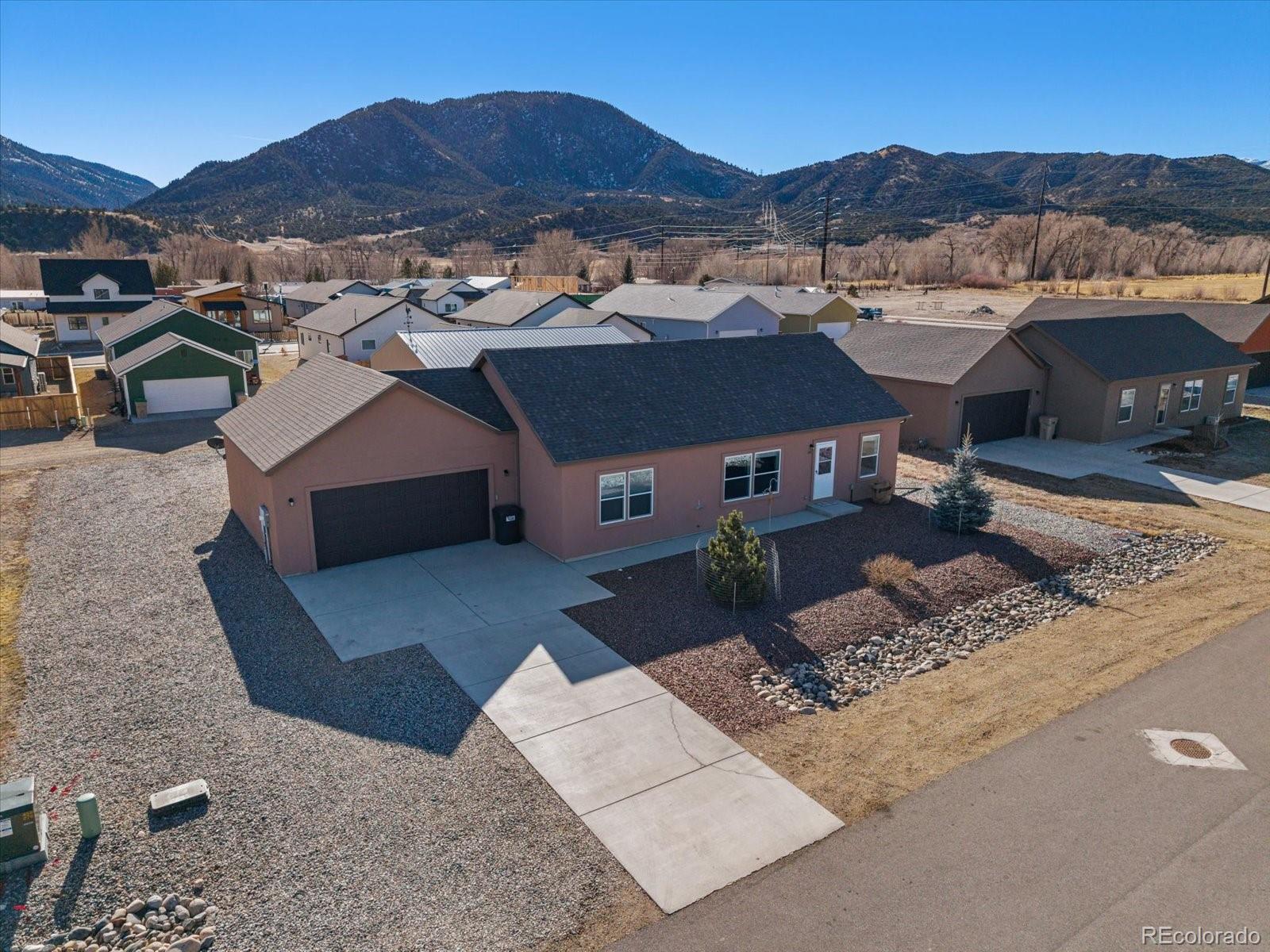 655 Quarry Station Poncha Springs, CO 81242 - Photo 2 of 41 an aerial view of a house with a mountain