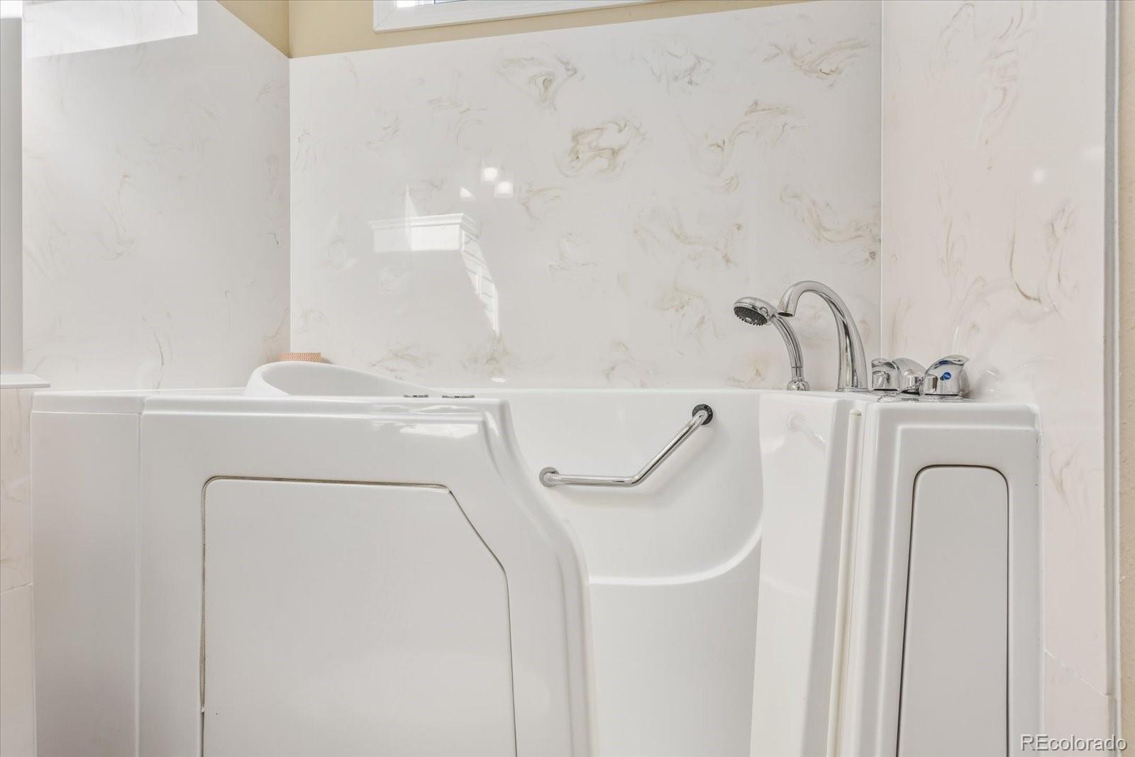 655 Quarry Station Poncha Springs, CO 81242 - Photo 21 of 42 a bathroom with shower a sink and a mirror