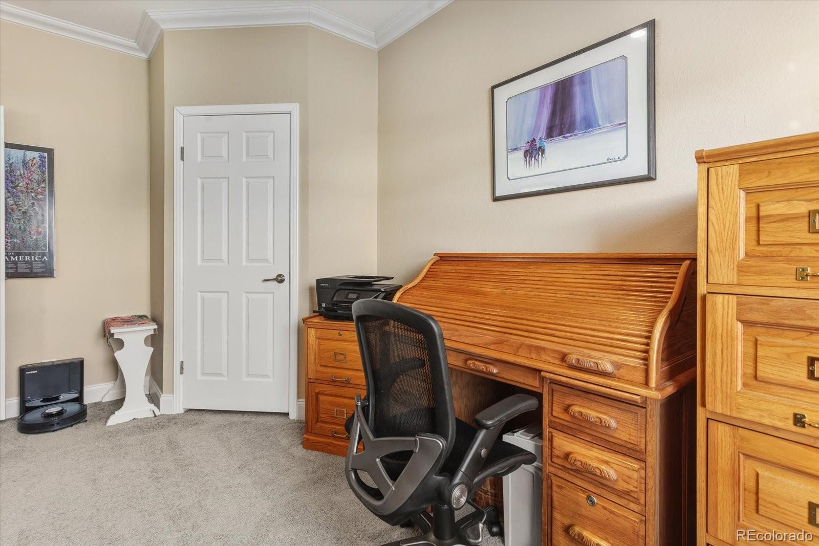 655 Quarry Station Poncha Springs, CO 81242 - Photo 23 of 42 a bedroom with a bed and a chair