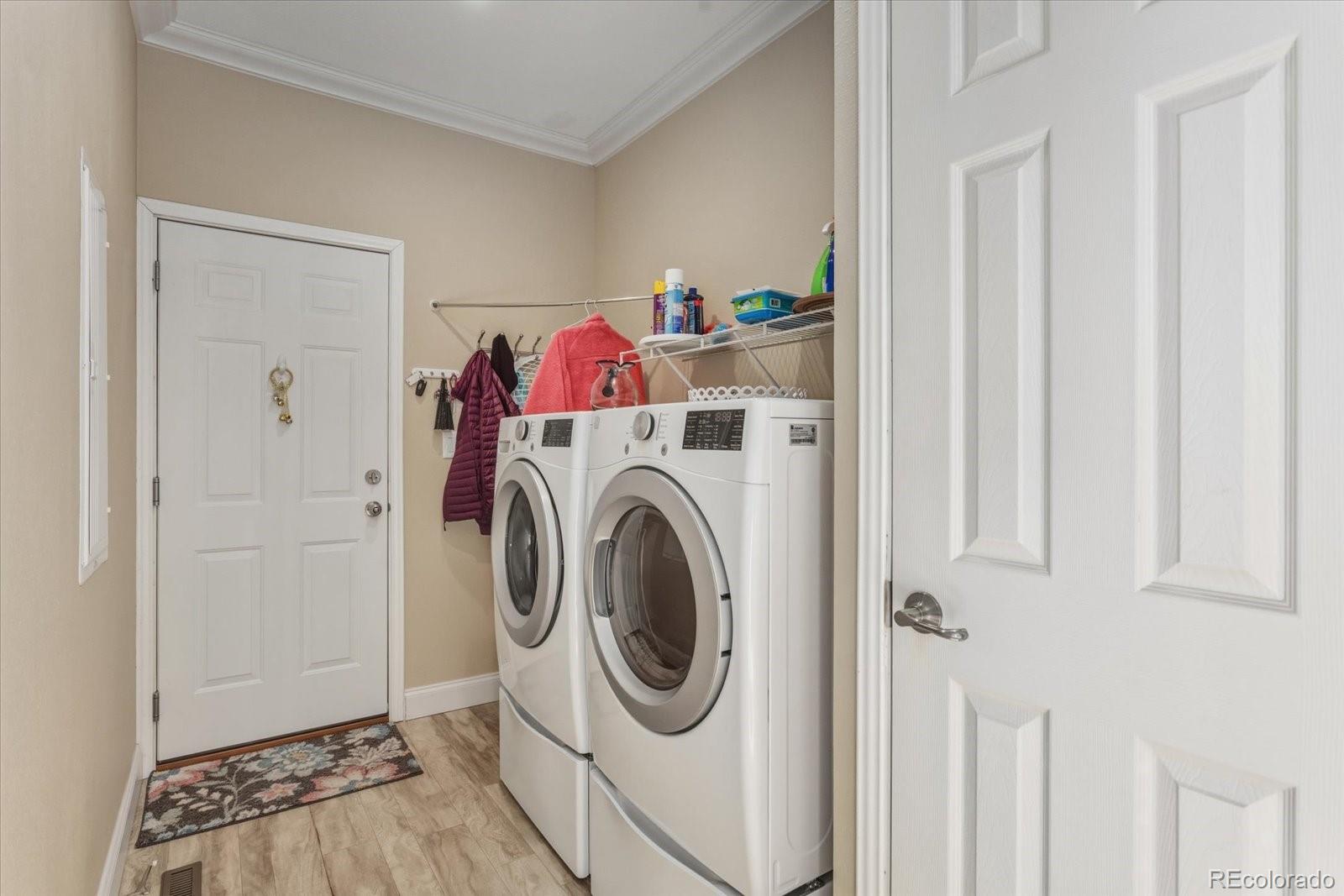655 Quarry Station Poncha Springs, CO 81242 - Photo 24 of 42 a utility room with dryer and washer