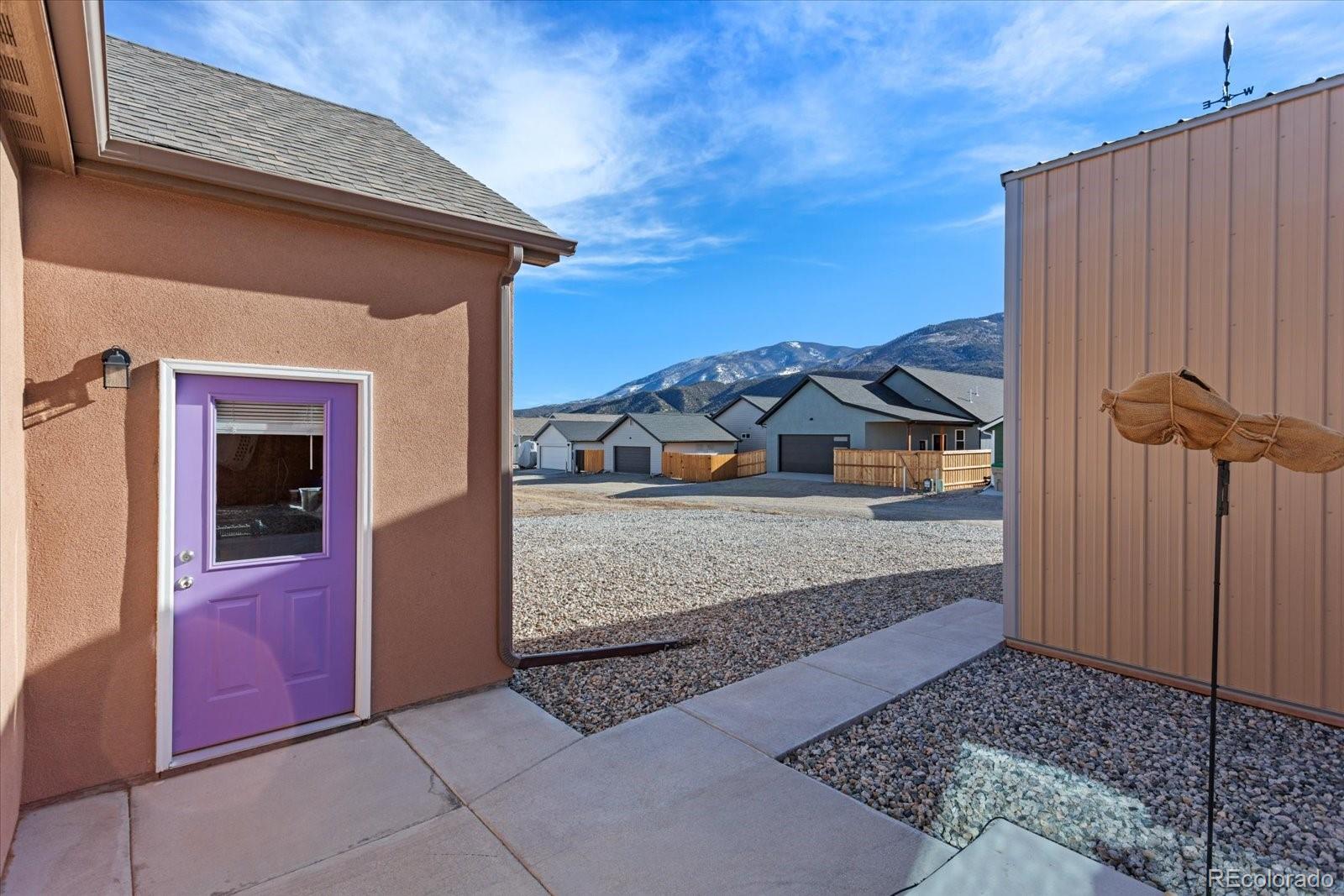655 Quarry Station Poncha Springs, CO 81242 - Photo 32 of 42 a view of front of house with a yard