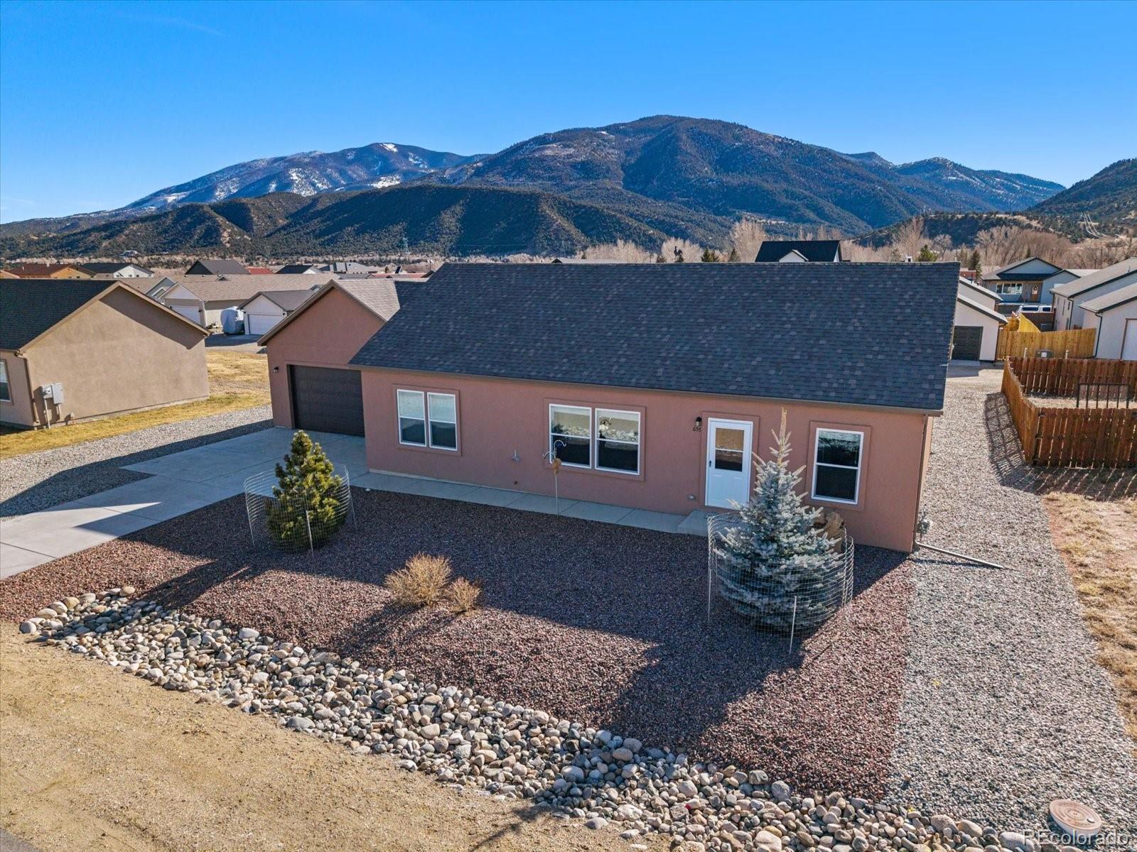 655 Quarry Station Poncha Springs, CO 81242 - Photo 37 of 41 a front view of a house with a yard