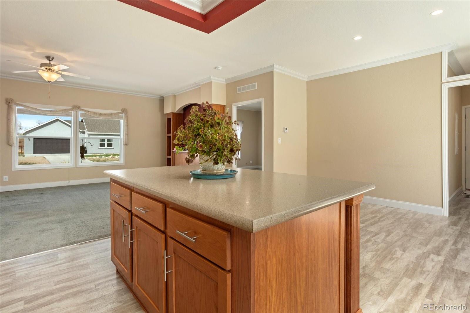 655 Quarry Station Poncha Springs, CO 81242 - Photo 9 of 41 a kitchen with stainless steel appliances a sink and a refrigerator