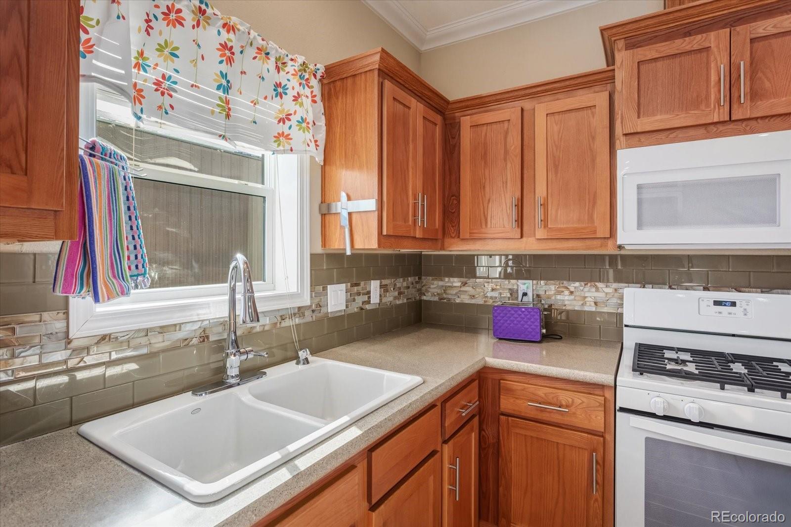 655 Quarry Station Poncha Springs, CO 81242 - Photo 9 of 42 a bathroom with a sink and a white cabinets