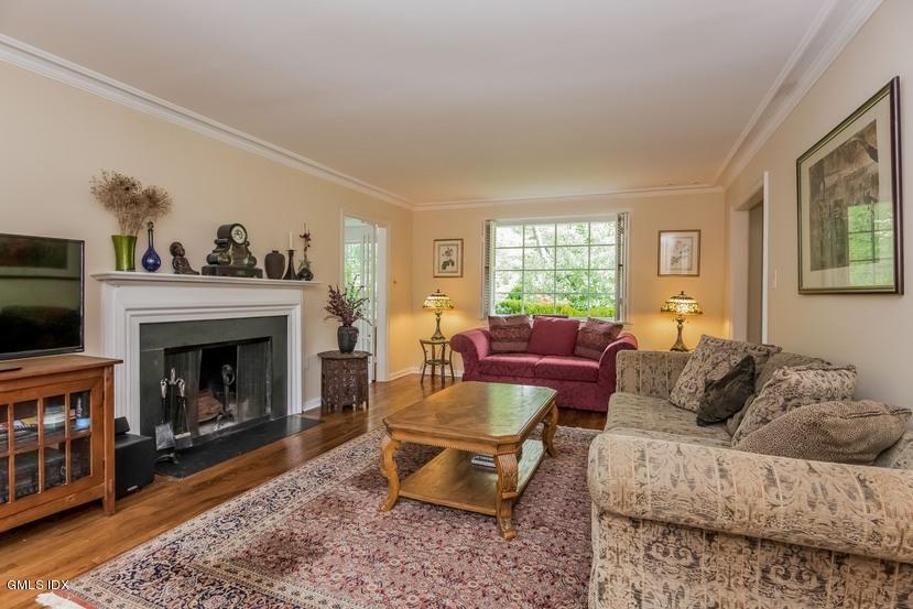 15 Pierce Road Riverside, CT 06878 - Photo 3 of 23 a living room with furniture and a fireplace