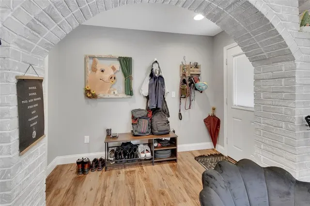 a room with furniture and wooden floor