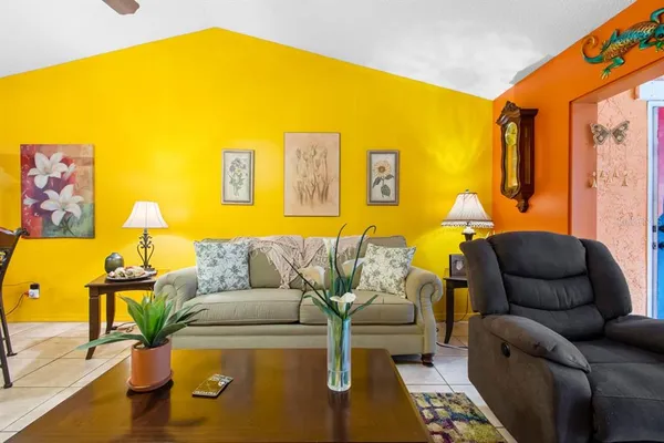 a bedroom with bed and window