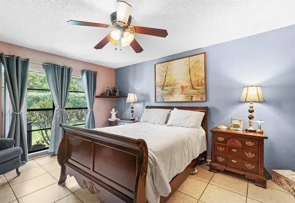 a building outdoor space with patio furniture and potted plants