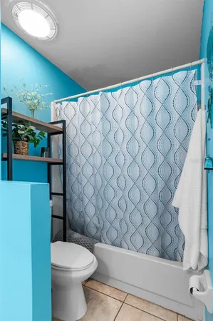 a view of house with yard