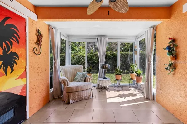 a view of a house with a flower garden