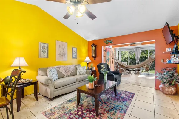 a living room with furniture and a table