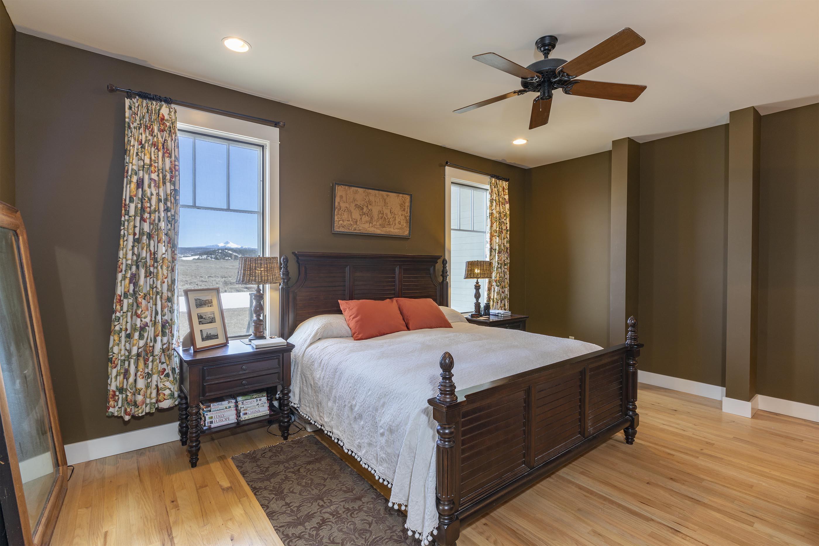 310 40aa Road Norwood, CO 81423 - Photo 13 of 35 a bedroom with a bed and a window