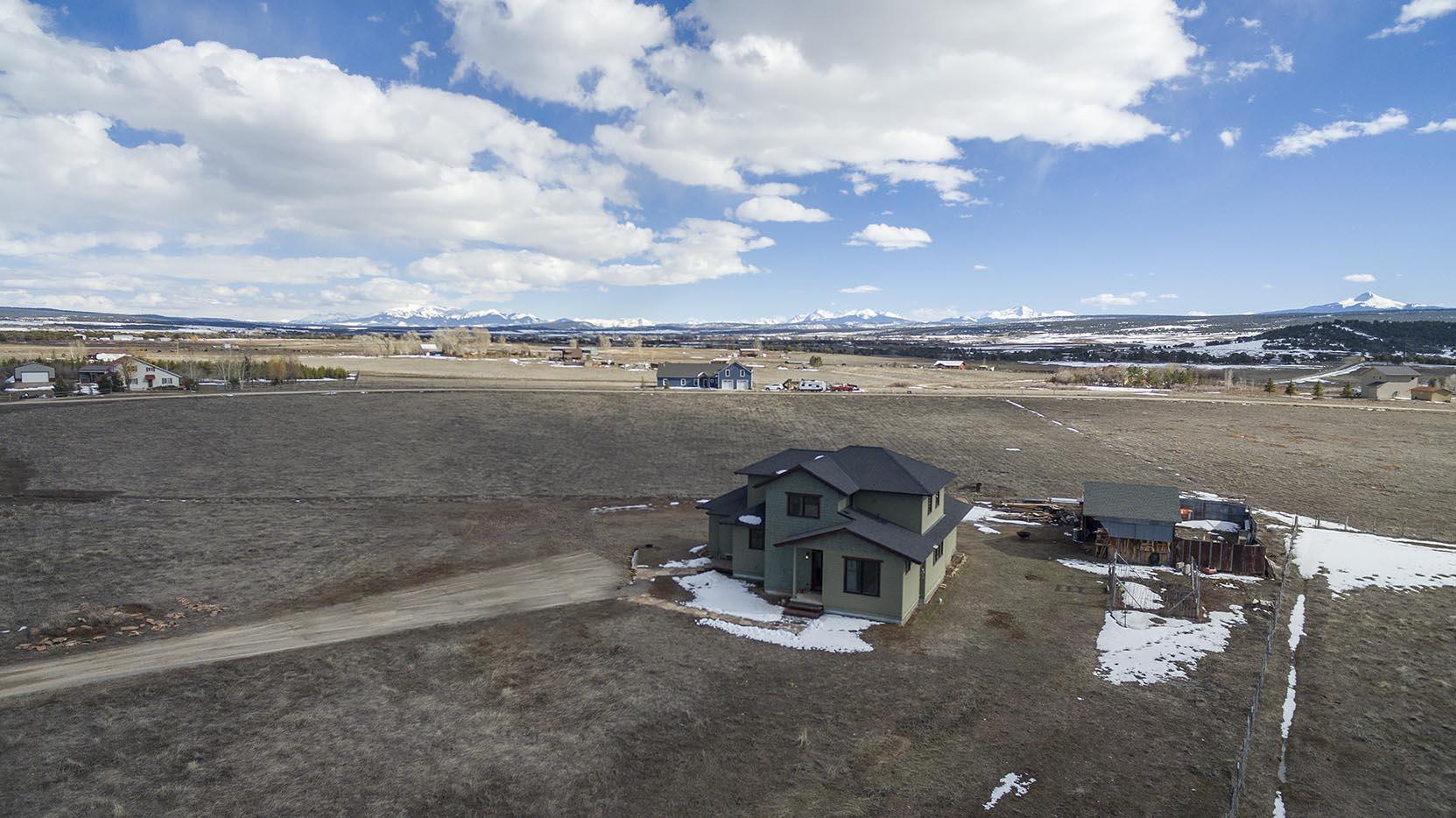 310 40aa Road Norwood, CO 81423 - Photo 32 of 35 a view of a lake with a city