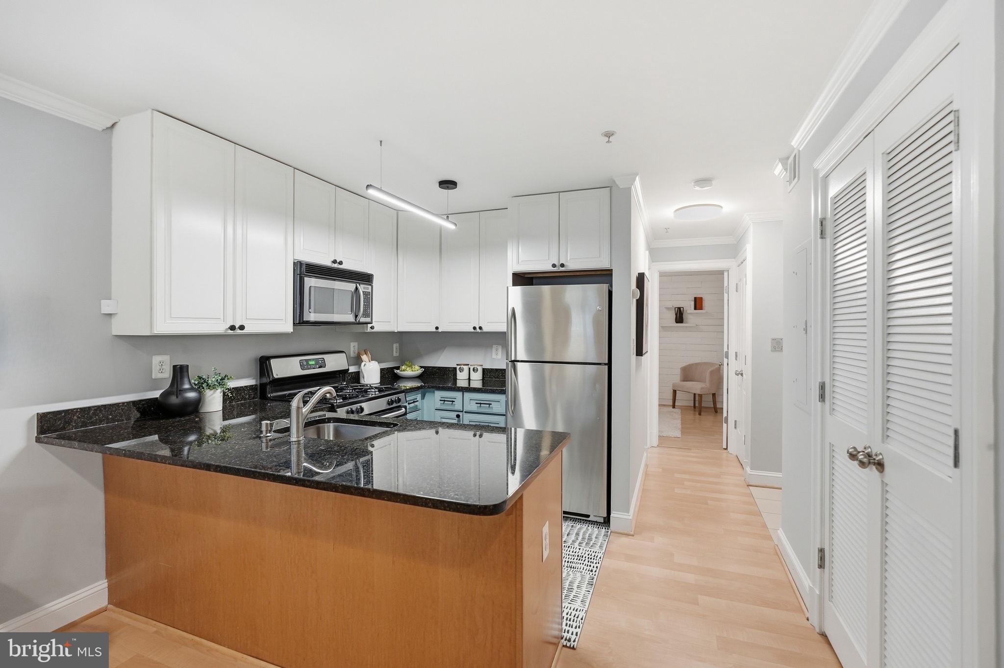 1740 18th Street Northwest, Unit T2 Washington, DC 20009 - Photo 2 of 14 Updated Kitchen w/ Stainless Steel Appliances
