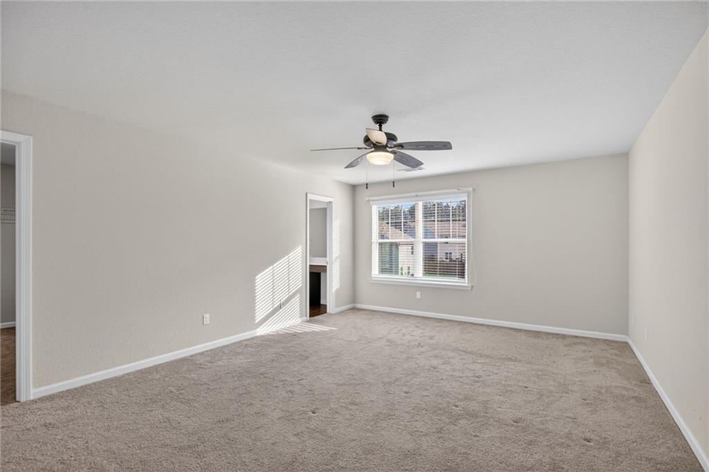 1003 Nandina Court Villa Rica, GA 30180 - Photo 13 of 43 a view of an empty room with a window