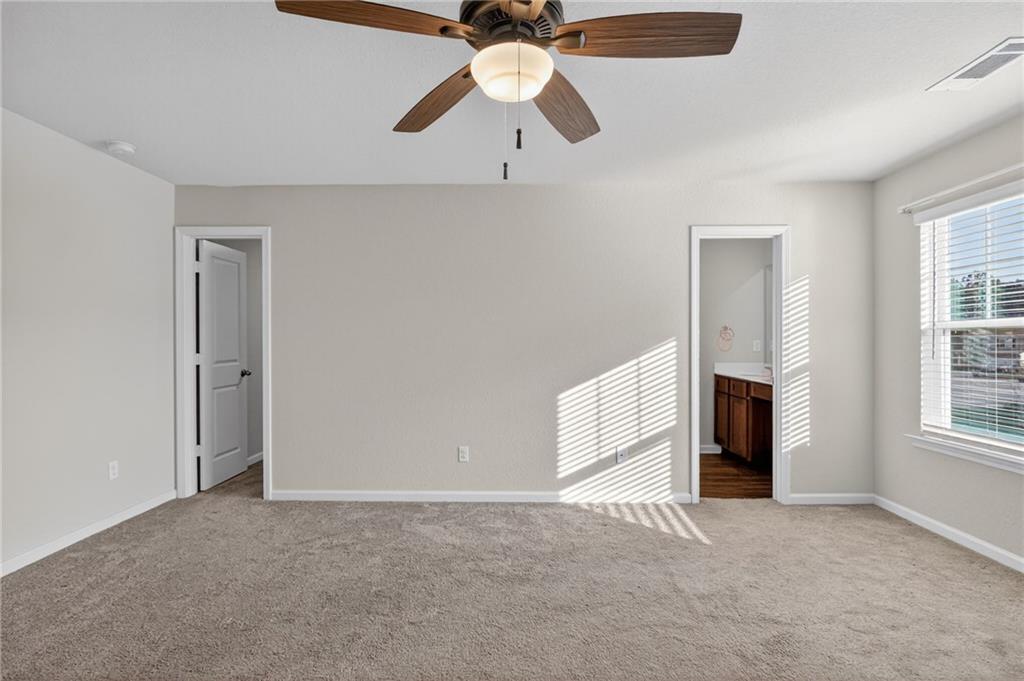 1003 Nandina Court Villa Rica, GA 30180 - Photo 14 of 43 a view of an empty room with a window