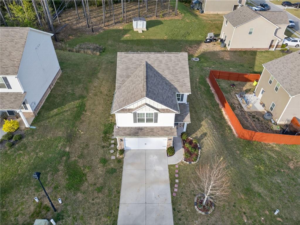 1003 Nandina Court Villa Rica, GA 30180 - Photo 27 of 43 an aerial view of a house with a yard