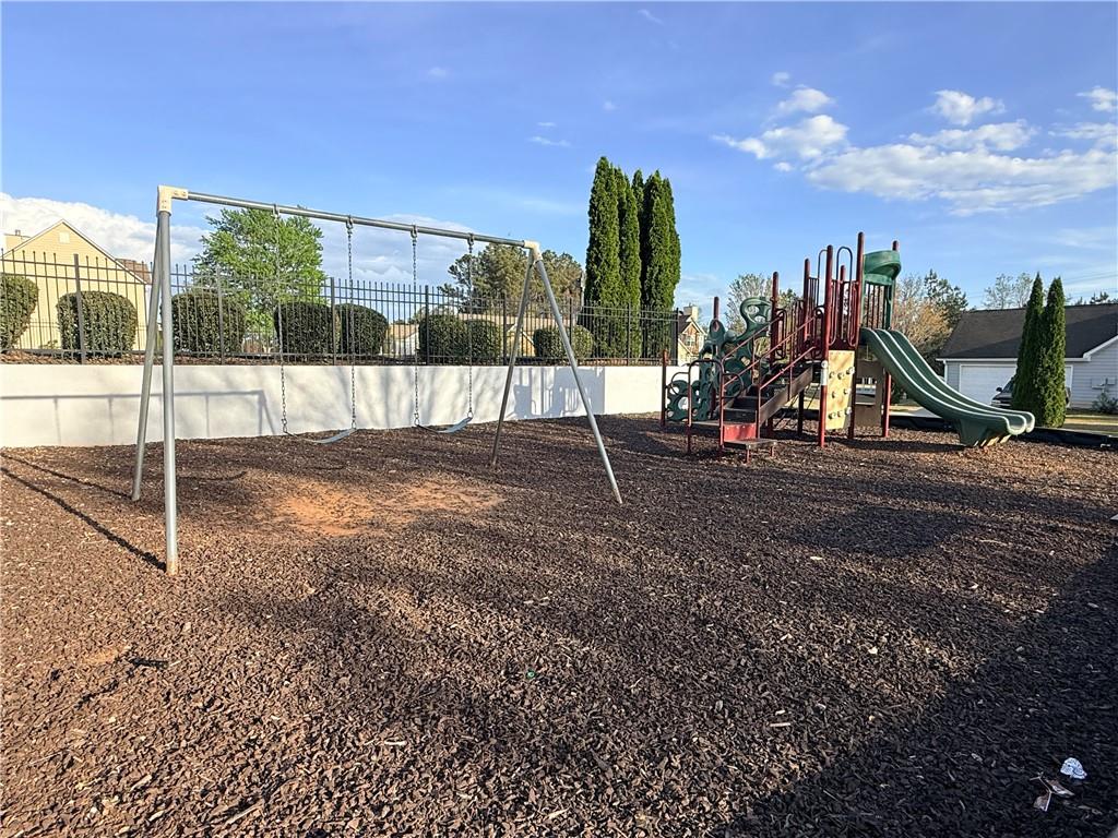1003 Nandina Court Villa Rica, GA 30180 - Photo 33 of 43 a view of a yard with porch