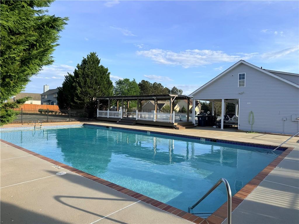1003 Nandina Court Villa Rica, GA 30180 - Photo 38 of 43 a view of swimming pool with chairs
