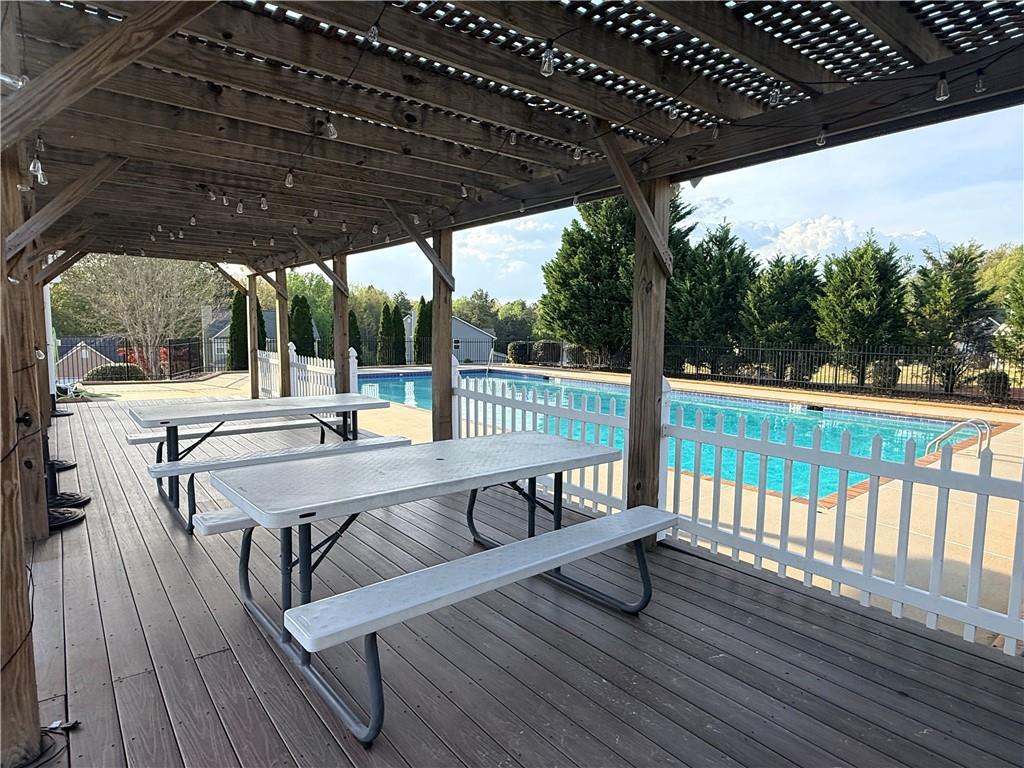 1003 Nandina Court Villa Rica, GA 30180 - Photo 40 of 43 a view of a chairs in wooden deck