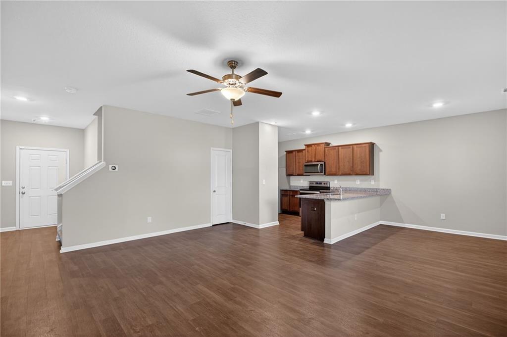 1003 Nandina Court Villa Rica, GA 30180 - Photo 6 of 43 a view of kitchen with sink microwave and stove