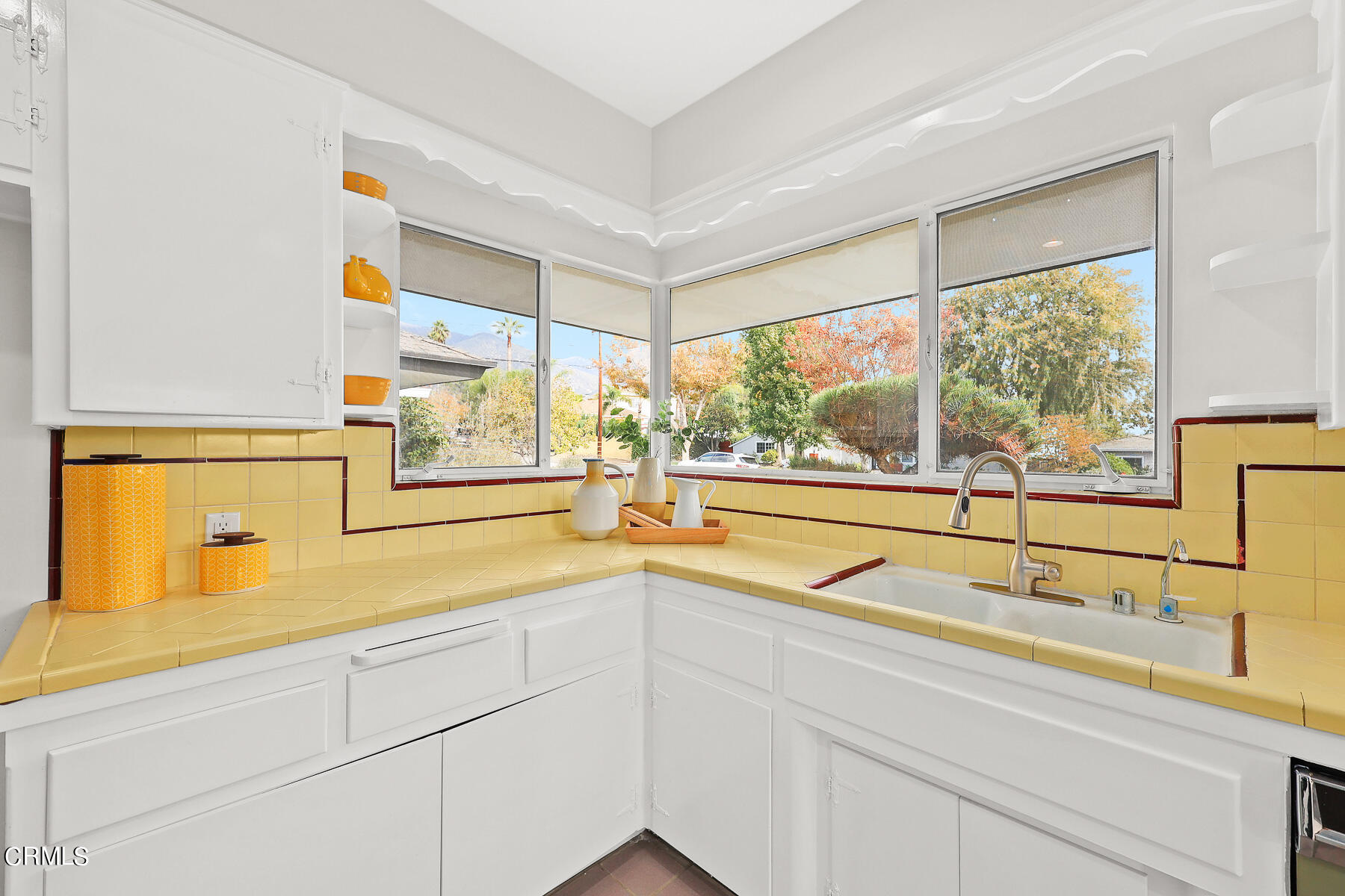 515 Cliff Drive Pasadena, CA 91107 - Photo 13 of 37 a view of a kitchen with a sink and large window