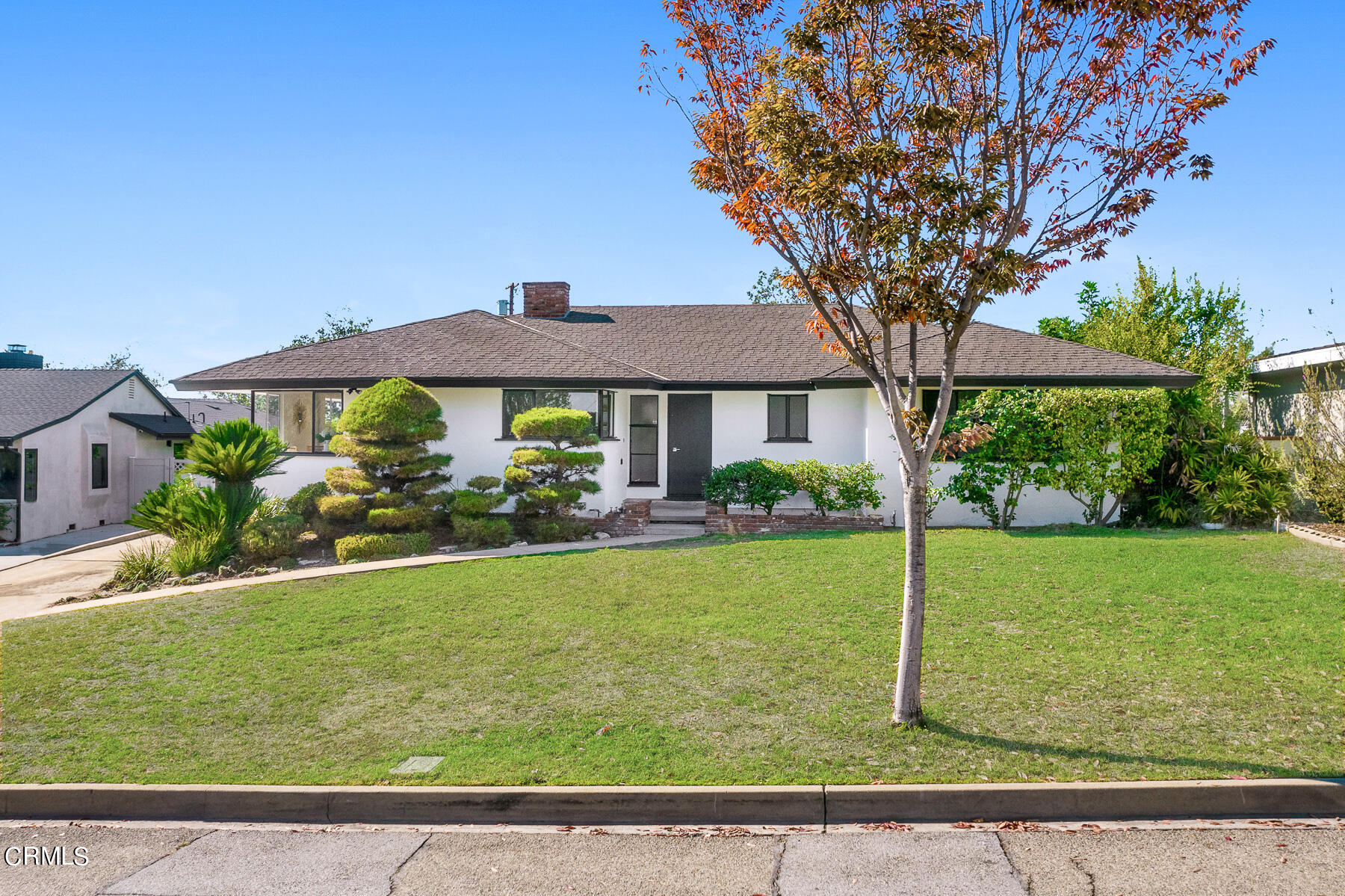 515 Cliff Drive Pasadena, CA 91107 - Photo 2 of 37 a front view of a house with garden