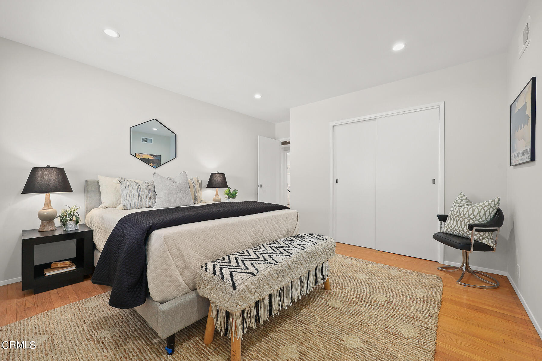 515 Cliff Drive Pasadena, CA 91107 - Photo 24 of 37 a bedroom with a bed and wooden floor