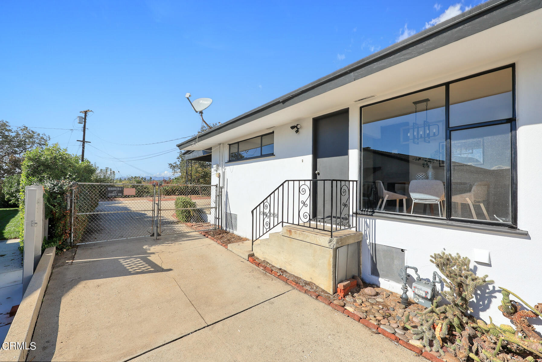 515 Cliff Drive Pasadena, CA 91107 - Photo 36 of 37 a view of a balcony with chairs and potted plants