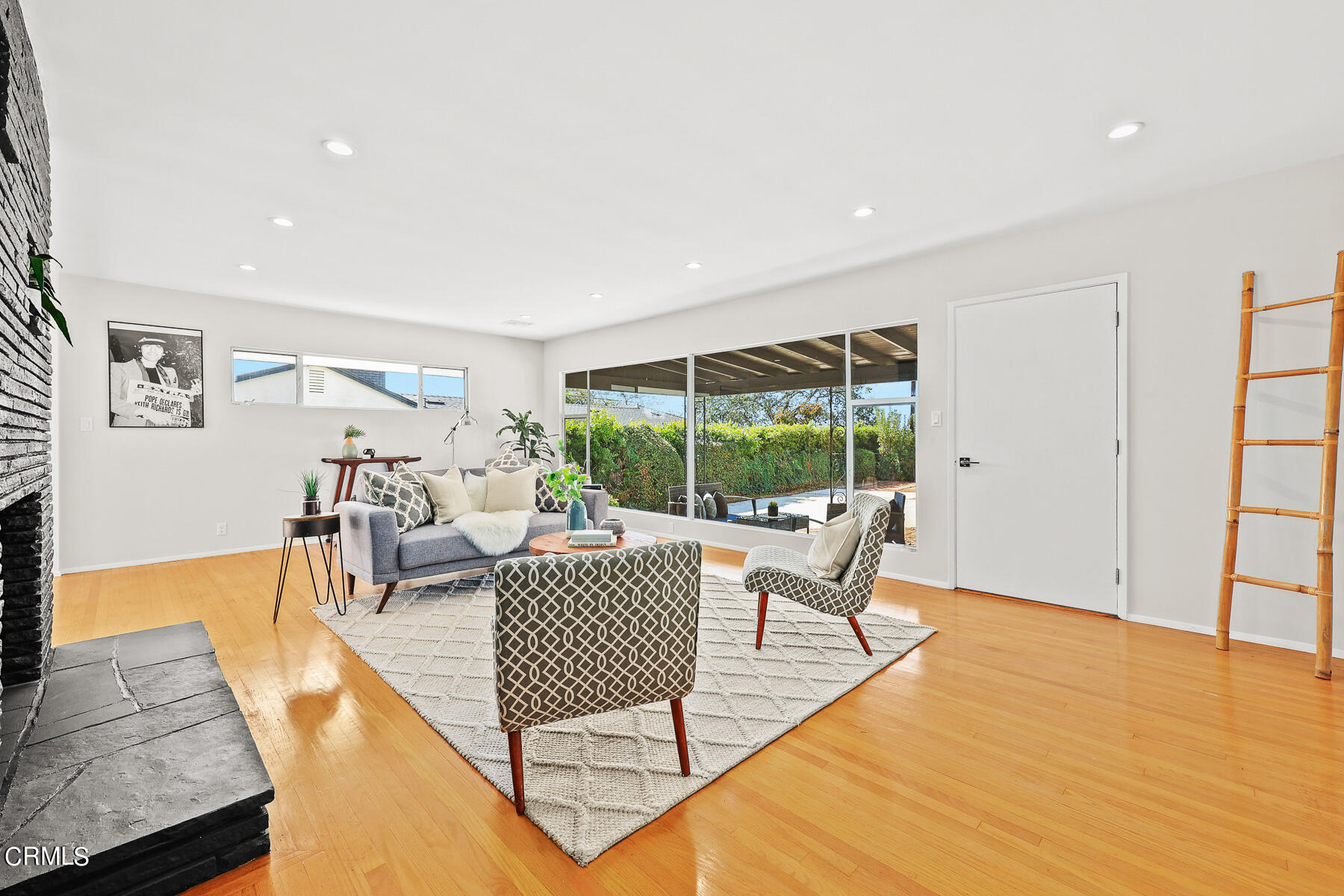 515 Cliff Drive Pasadena, CA 91107 - Photo 6 of 37 a living room with furniture and a large window
