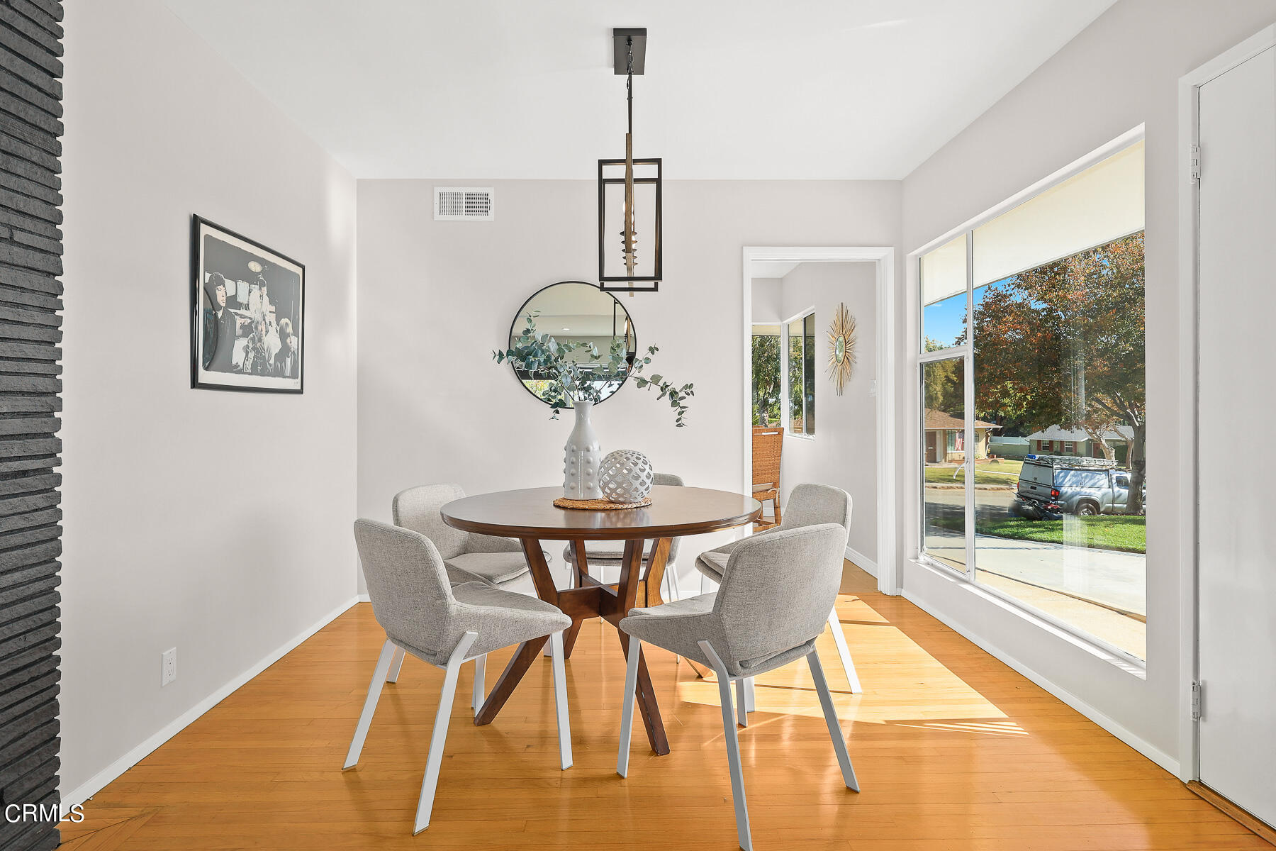 515 Cliff Drive Pasadena, CA 91107 - Photo 10 of 37 a view of a dining room with furniture wooden floor and chandelier